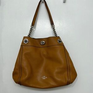 tan leather coach hobo shoulder bag with silver detail